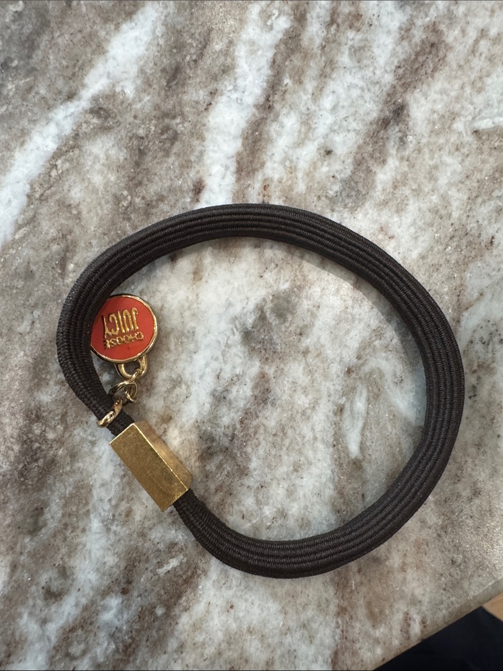 Juicy couture bracelet and hair tie